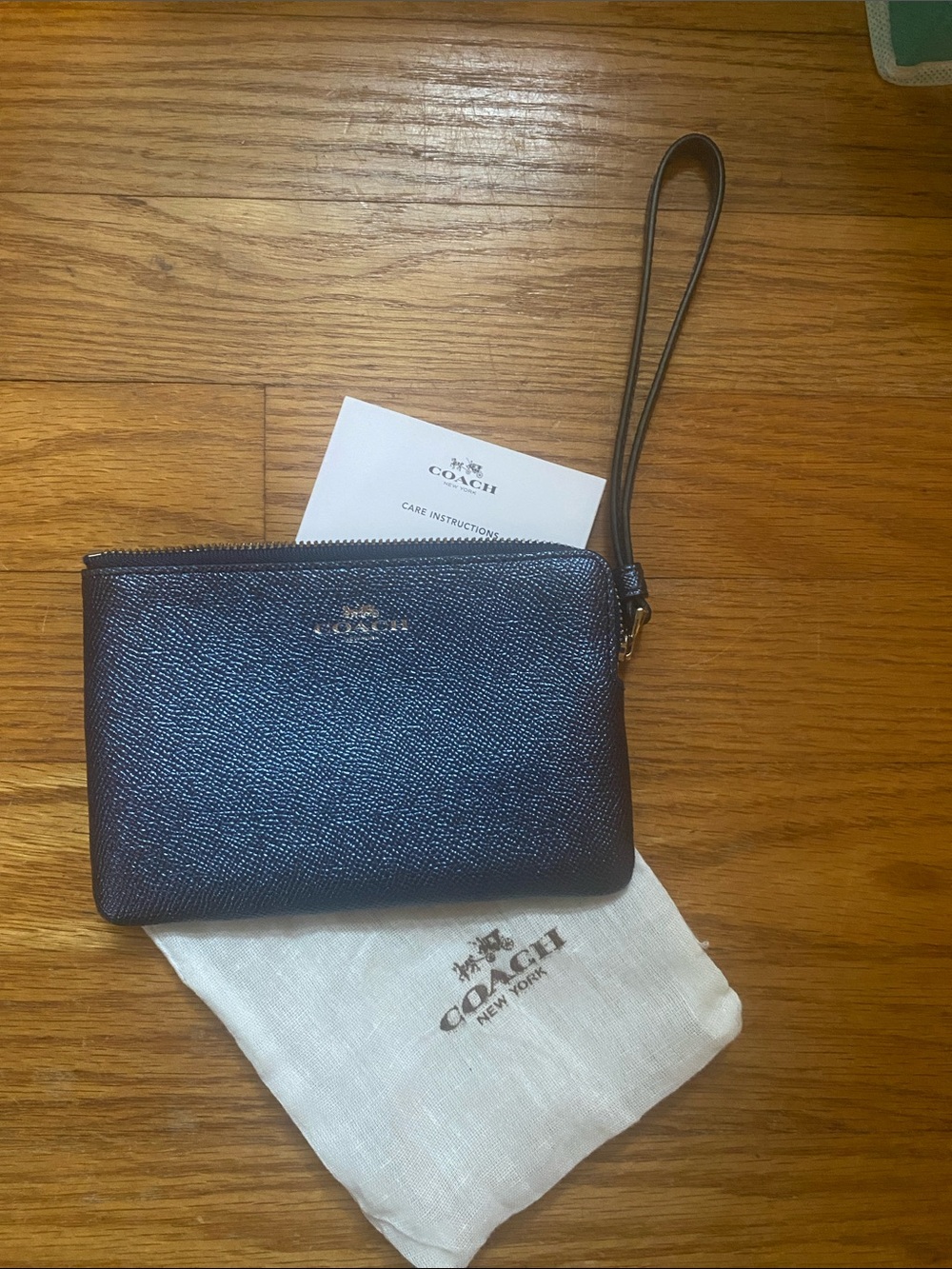 Coach Navy Iredescent Textured Leather Wristlet with Gold Logo